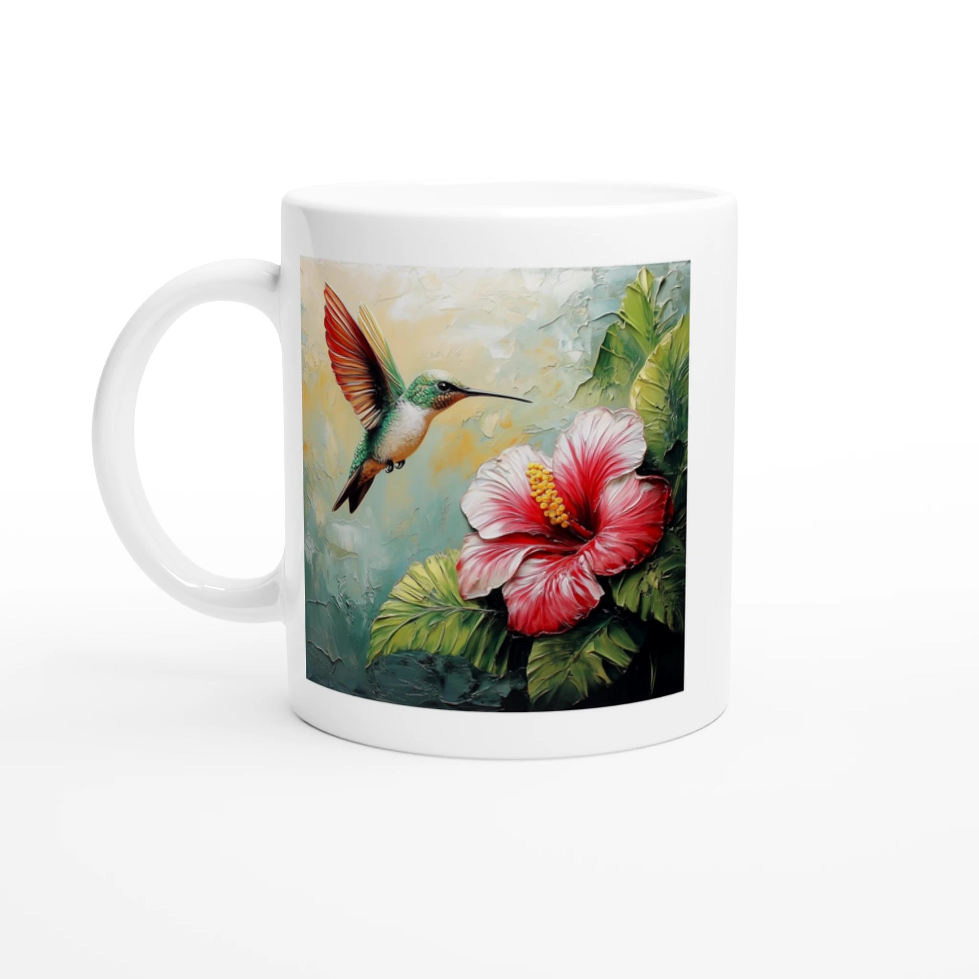 White mug with a design of a hummingbird and pink flower on a white background