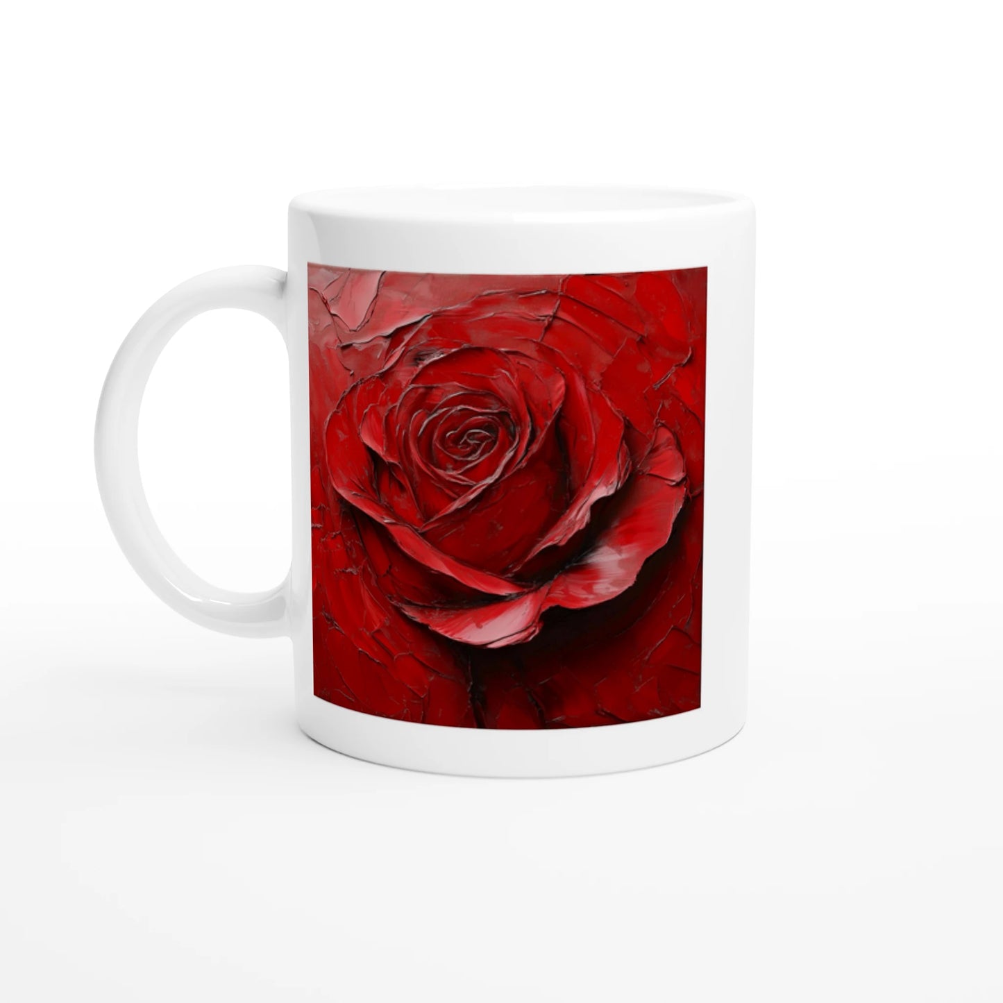 White mug with a red rose design on a white background